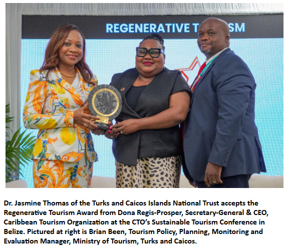 Dr. Jasmine Thomas of the Turks and Caicos Islands National Trust accepts the Regenerative Tourism Award from Dona Regis-Prosper, Secretary-General & CEO, Caribbean Tourism Organization at the CTO’s Sustainable Tourism Conference in Belize. Pictured at right is Brian Been, Tourism Policy, Planning, Monitoring and Evaluation Manager, Ministry of Tourism, Turks and Caicos.