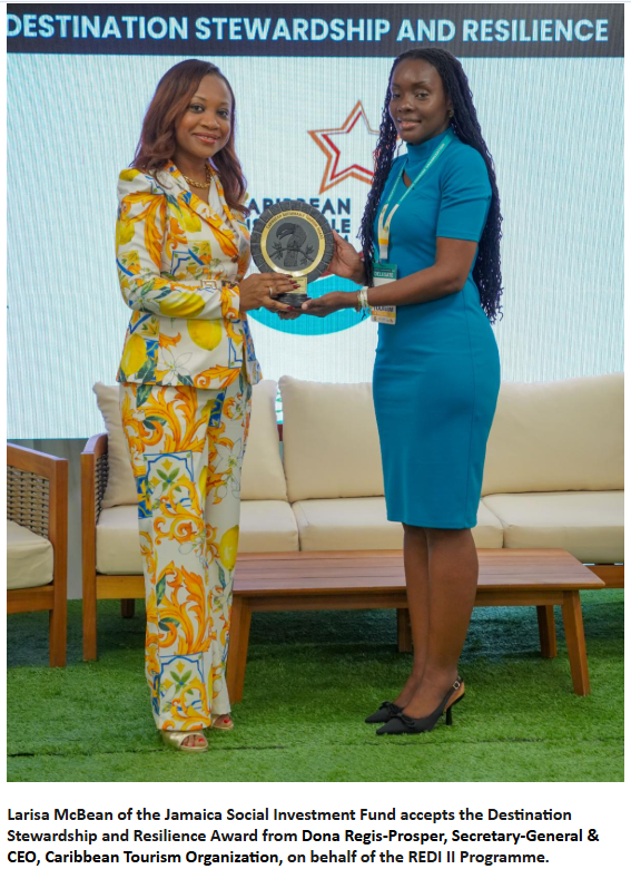 Larisa McBean of the Jamaica Social Investment Fund accepts the Destination Stewardship and Resilience Award from Dona Regis-Prosper, Secretary-General & CEO, Caribbean Tourism Organization, on behalf of the REDI II Programme.